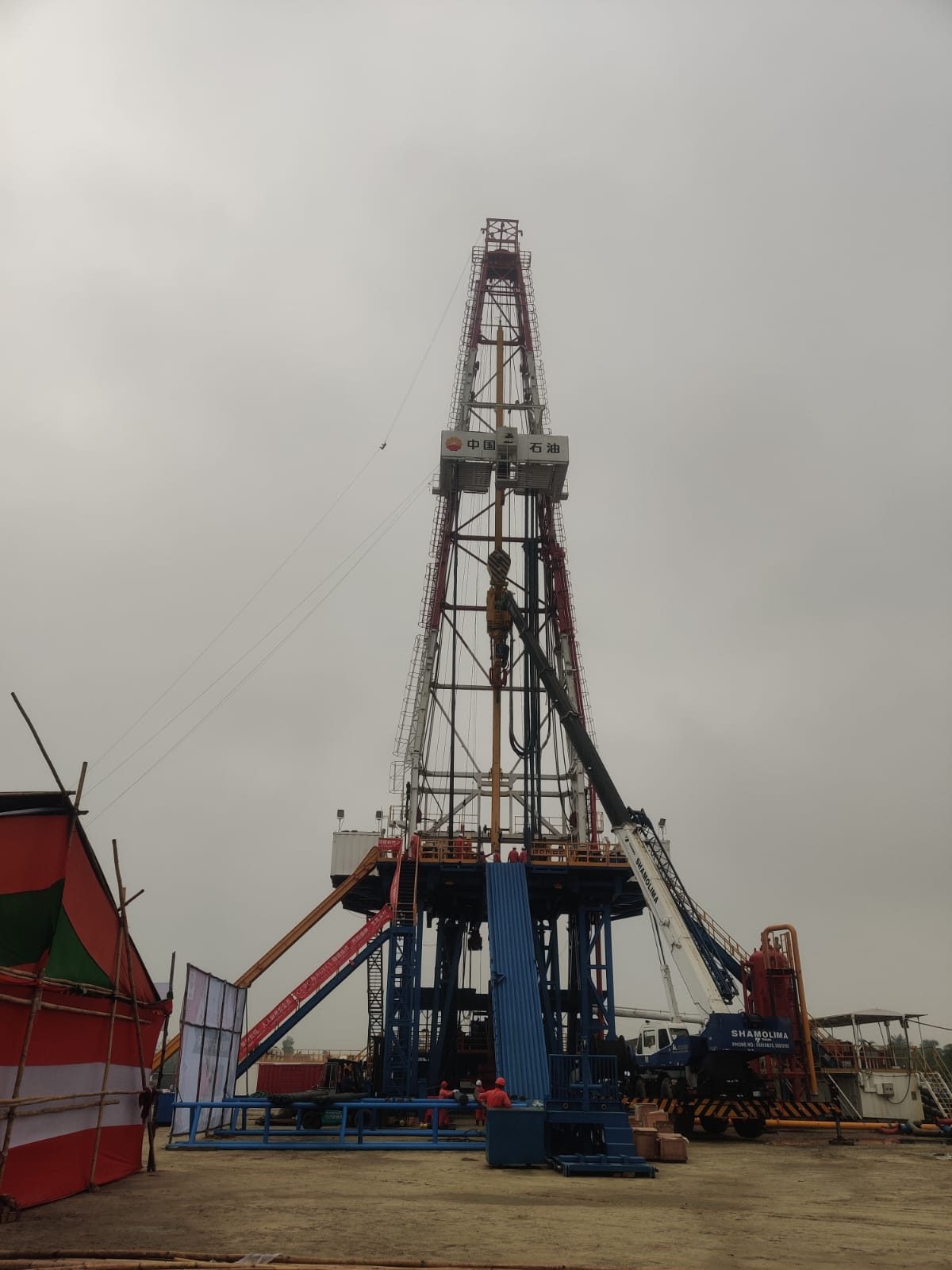 A CCDC rig standing over a well in Bangladesh