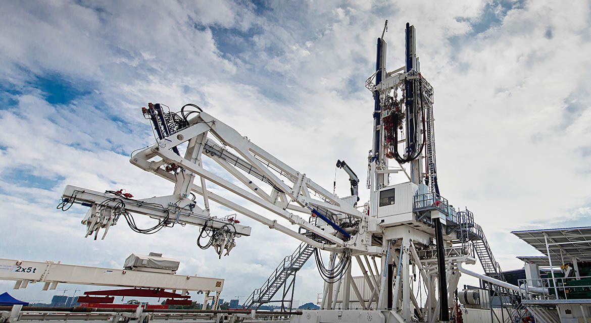 An automated CCDC drilling rig with pipe handling equipment